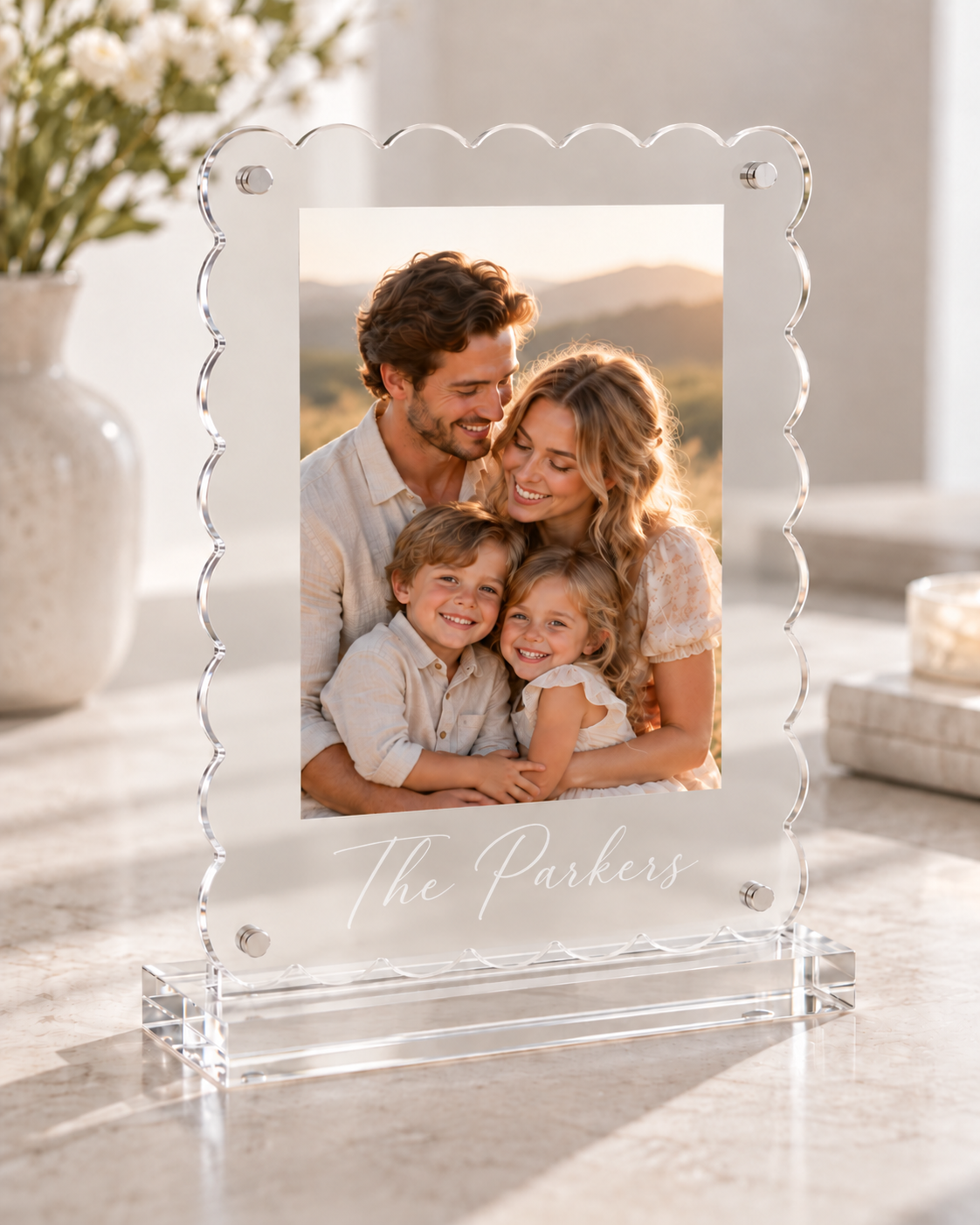 Scalloped acrylic photo frame with family portrait engraved The Parkers