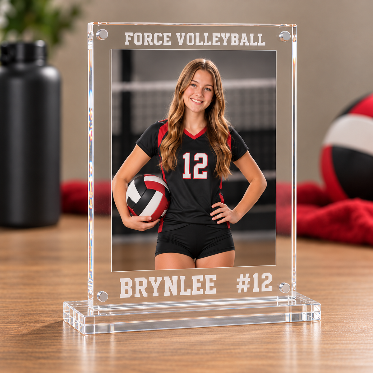 Personalized Force Volleyball acrylic photo frame with Brynlee name and number 12 in a flat clear slotted acrylic base