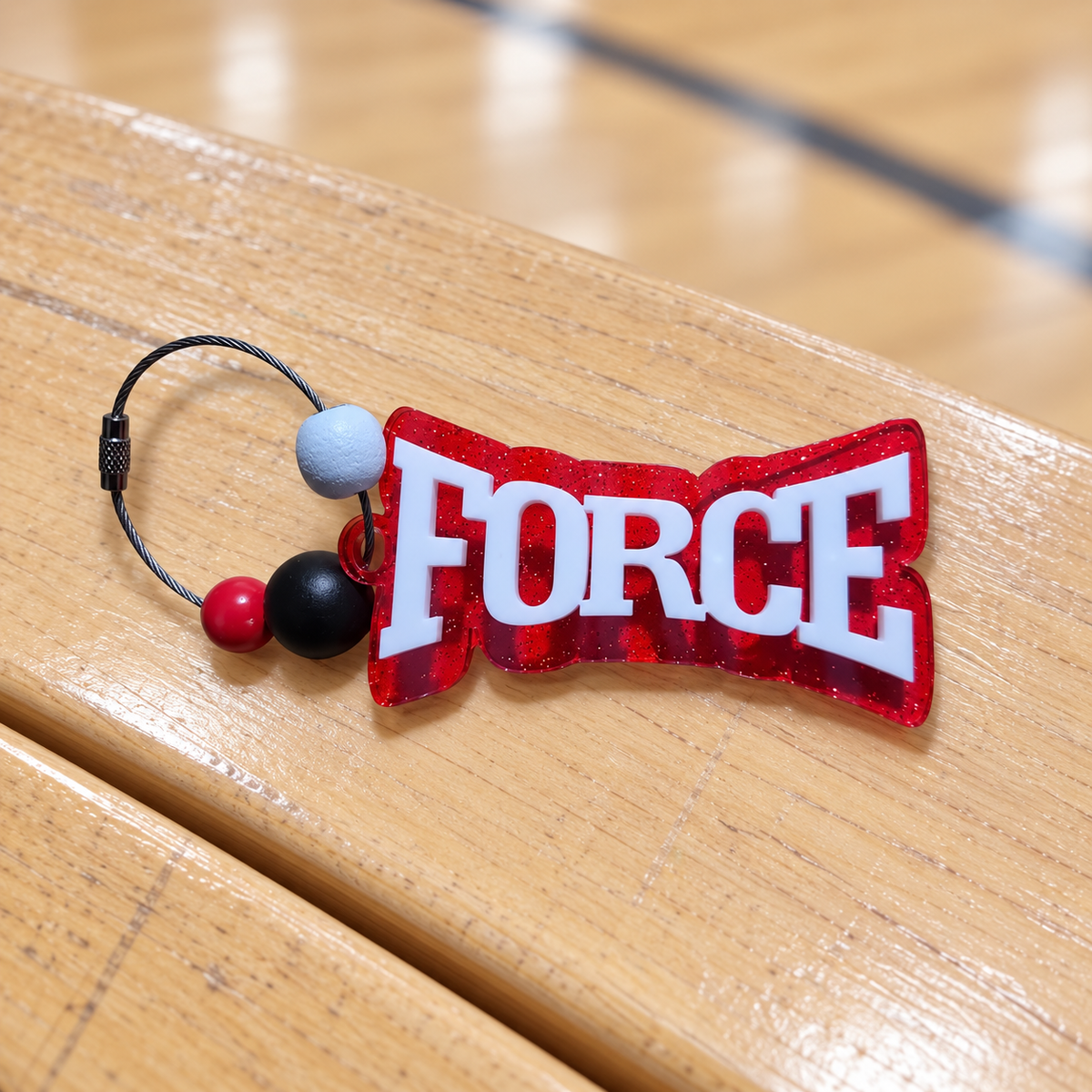 Houston Force layered acrylic bag tag; finishing choices made at Media Day booth