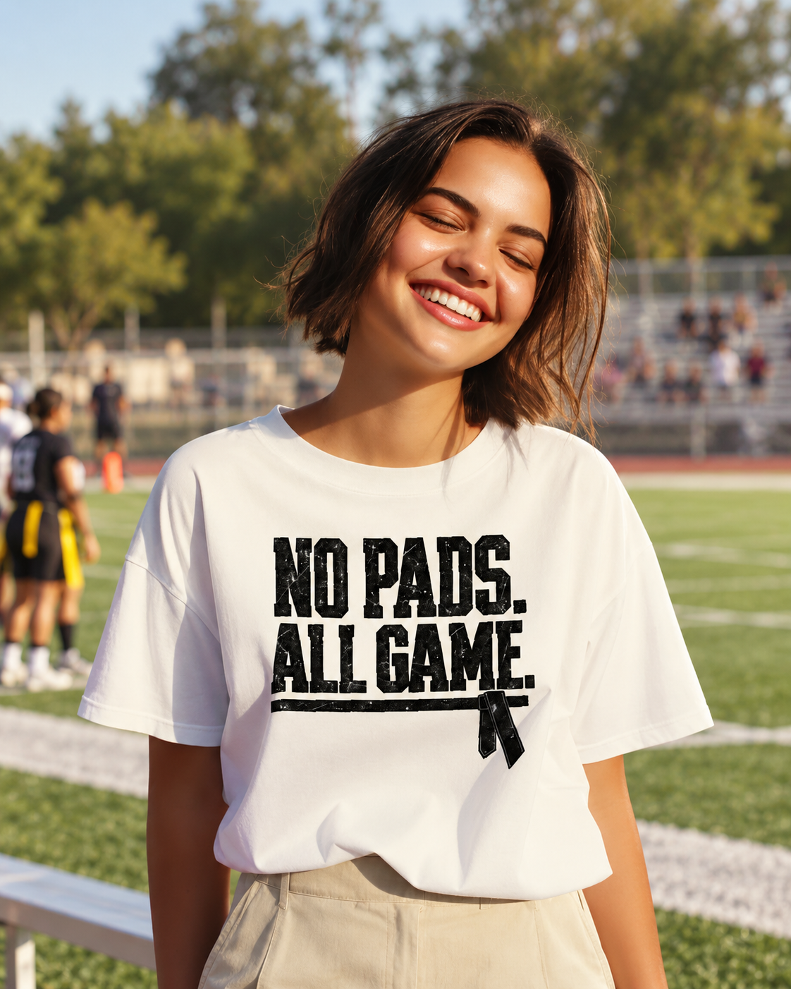 No Pads. All Game. Flag Football Tee shown in a natural sports setting