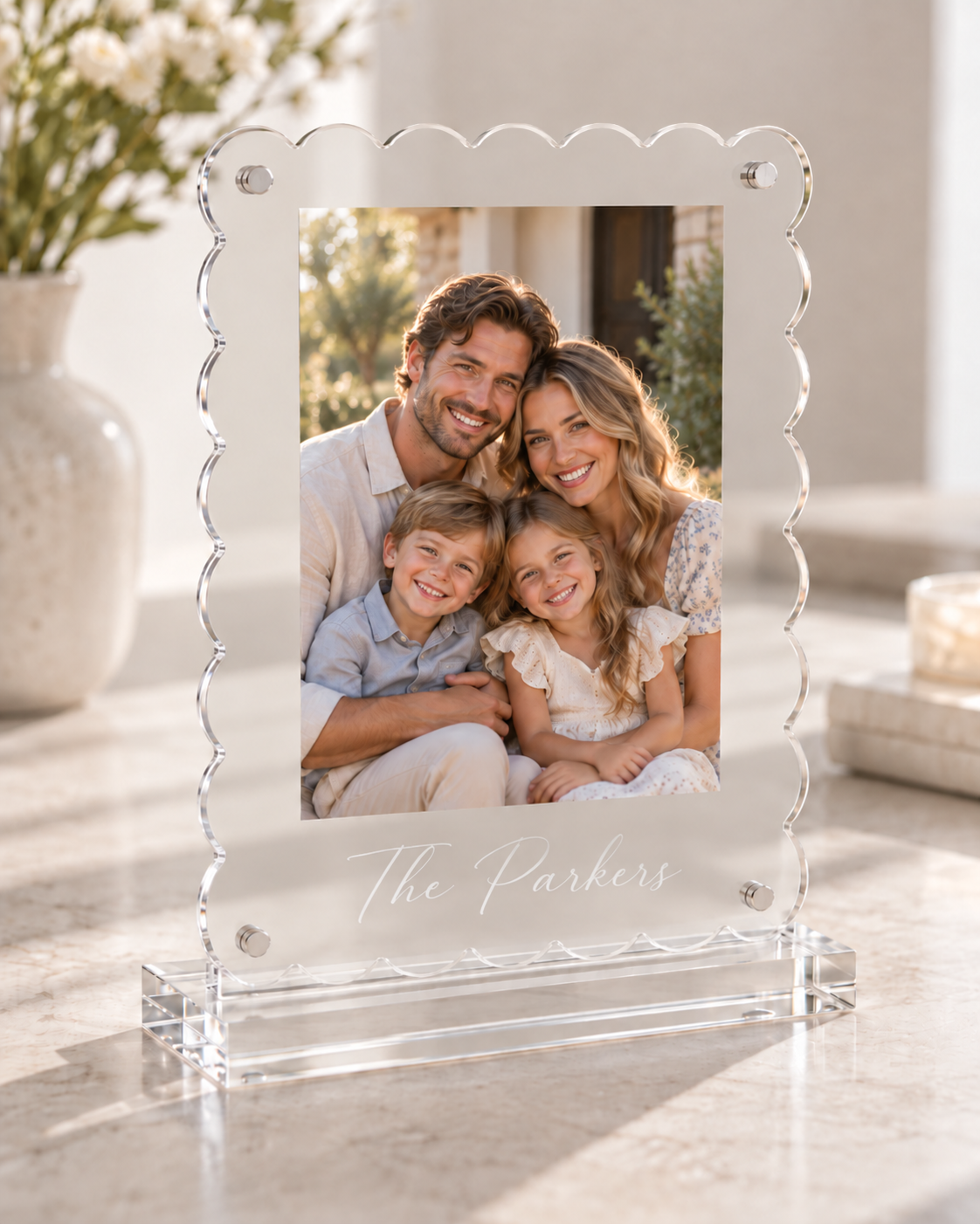 Scalloped acrylic photo frame with alternate family portrait engraved The Parkers