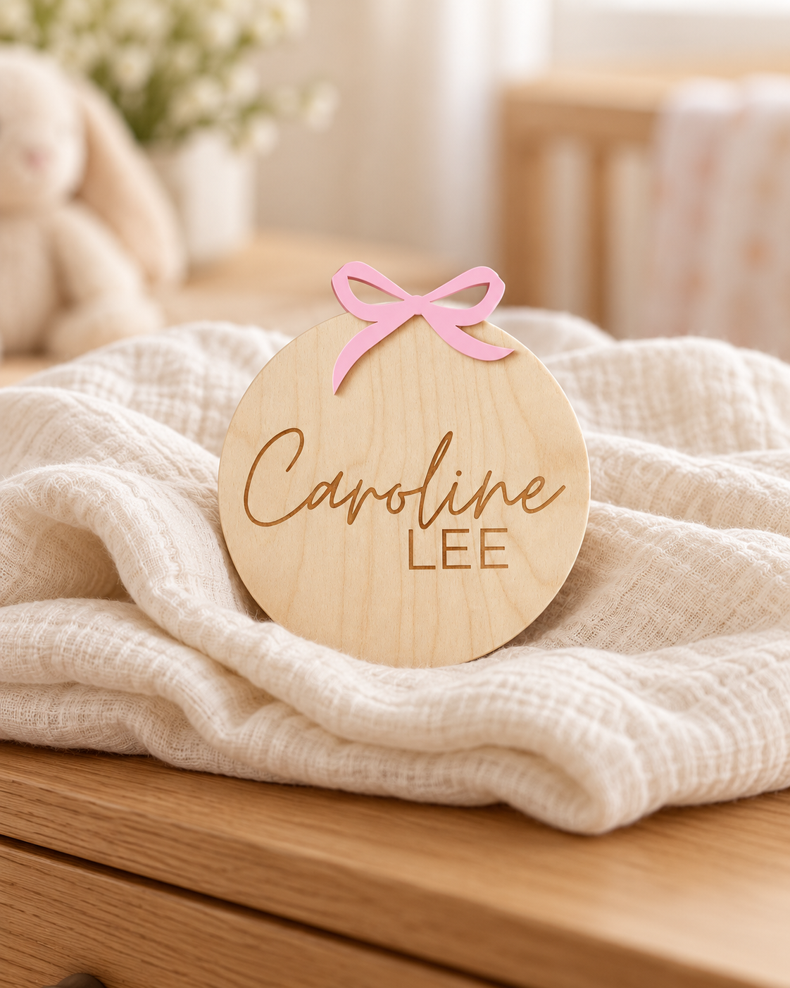 Personalized Wooden Baby Birth Announcement Sign in a warm naturally lit setting
