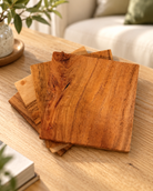 Custom Wooden Coasters in a warm naturally lit setting